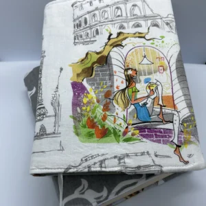 Obal na knihu Žena v okne a šedé ornamenty
